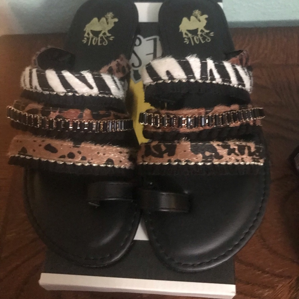 Cute black sandals with animal print straps